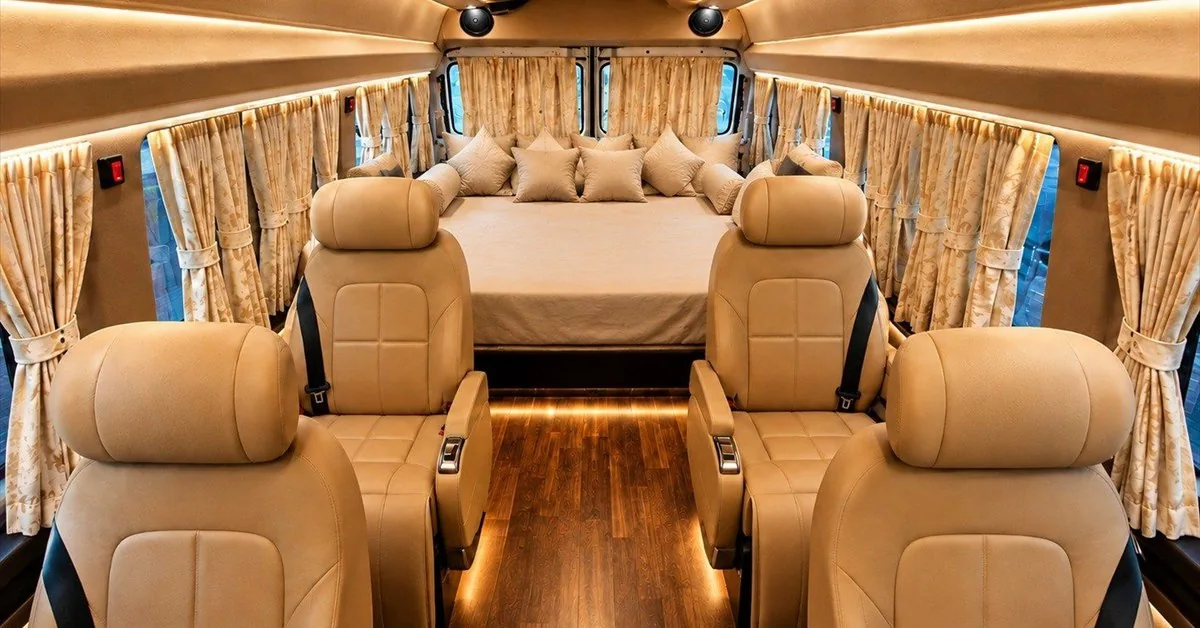 The Roving Suites rear lounge in its bed arrangement behind four recliners